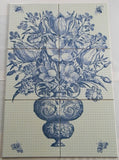 An antique vase with flowers.  Bathroom tile mosaic/Kitchen backsplash.