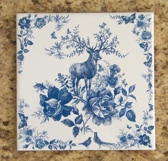 Blue deer kitchen trivet on ceramic tile