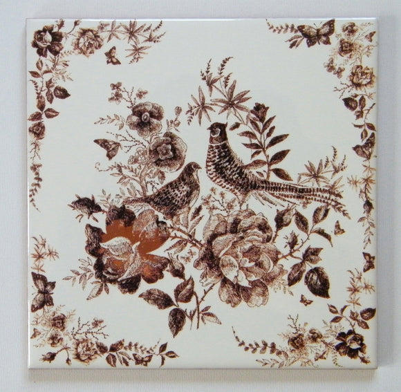 Painting brown birds on ceramic tile