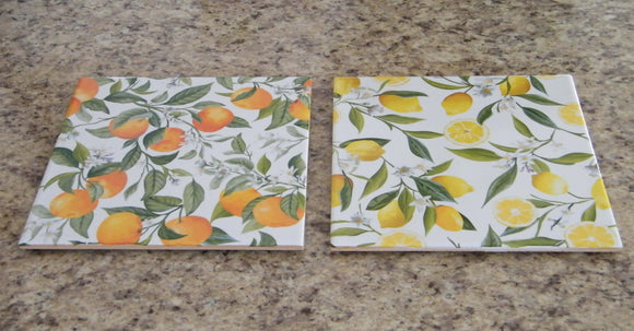 Juicy lemons and matured tangerines. Ceramic trivet